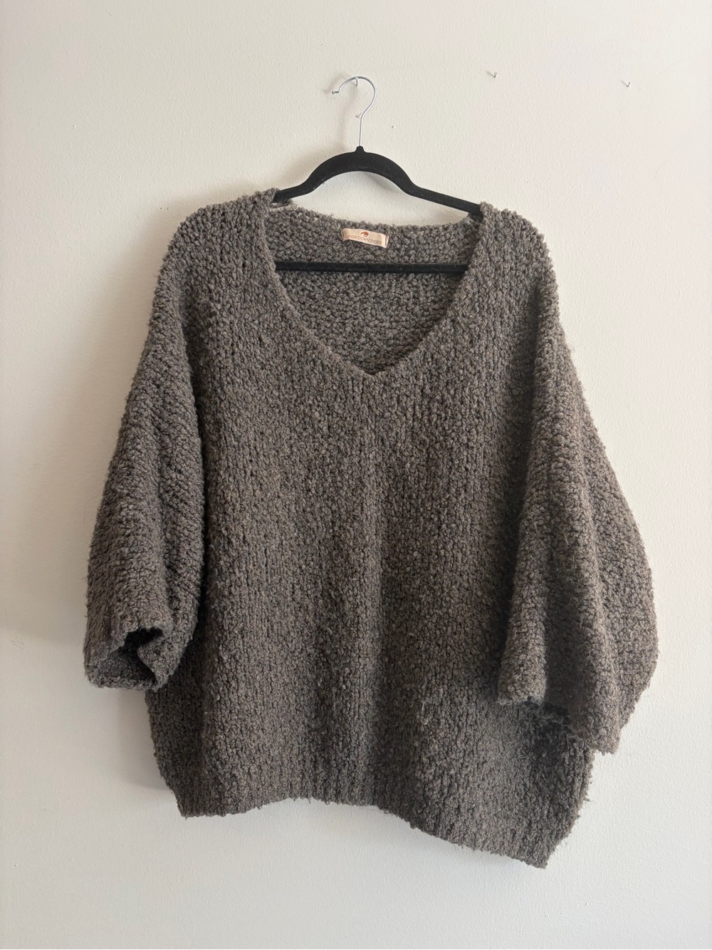 Relaxed V-Neck Bouclé Sweater in mocha gray